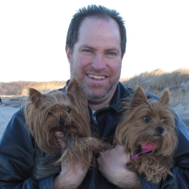Man with two dogs
